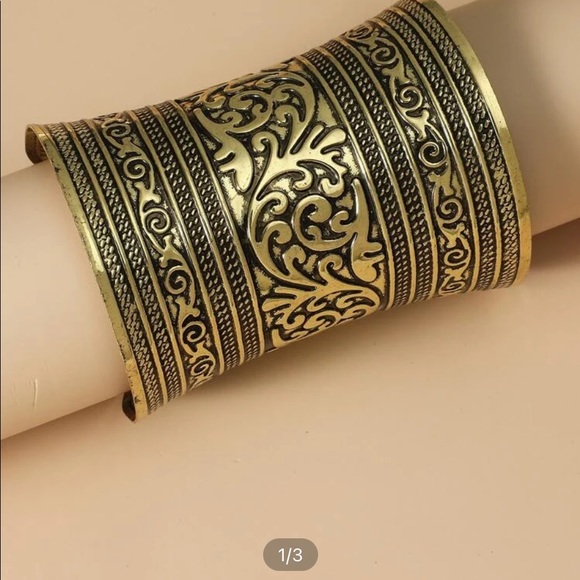 BOGO -50%!!Adjustable metal wrist cuff. Dope statement to almost any ensemble!! - Picture 2 of 2